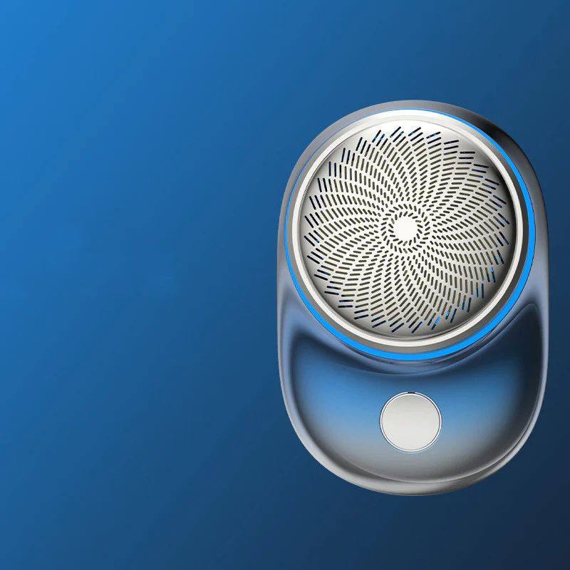 compact portable mini electric shaver in blue and silver with circular blade design and power button